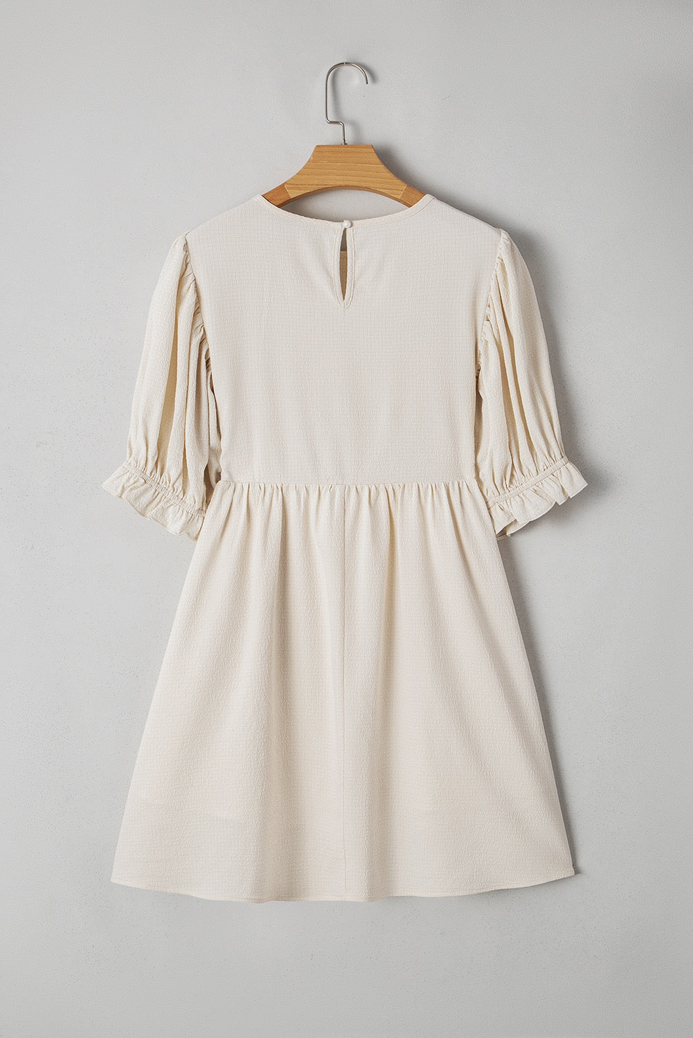 White Textured Ruffled Dress March.